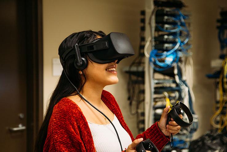 Student wearing virtual reality headset